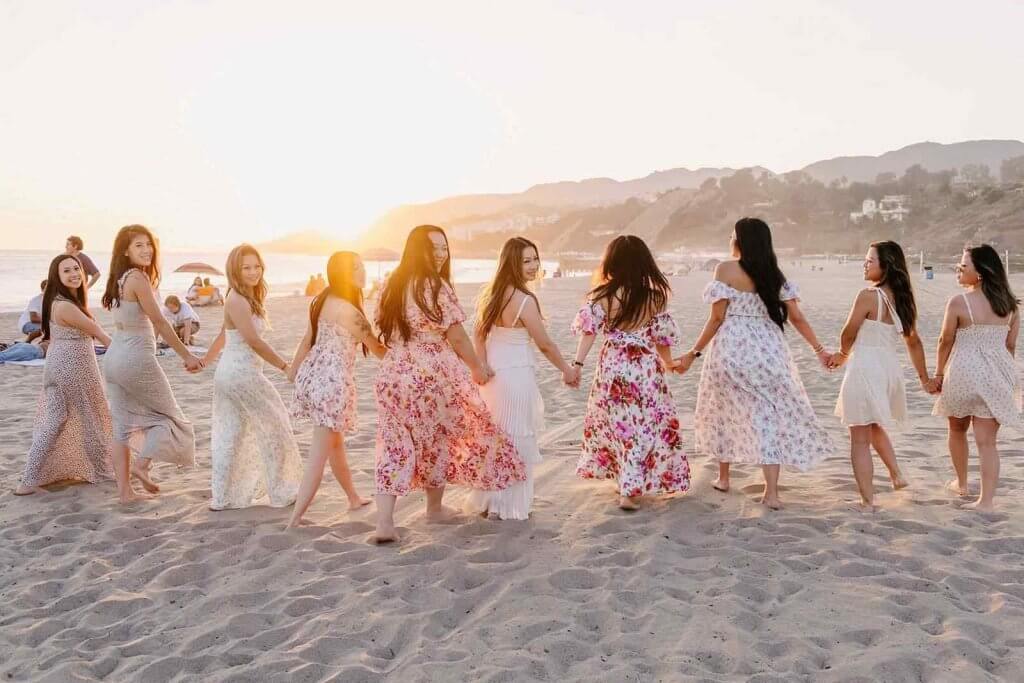 beachside bridal weekend with friends in flowy dresses