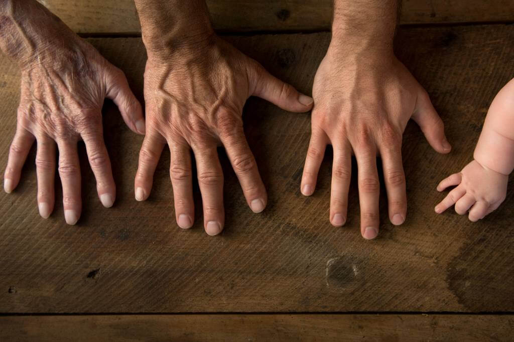 Hands joined in a family moment