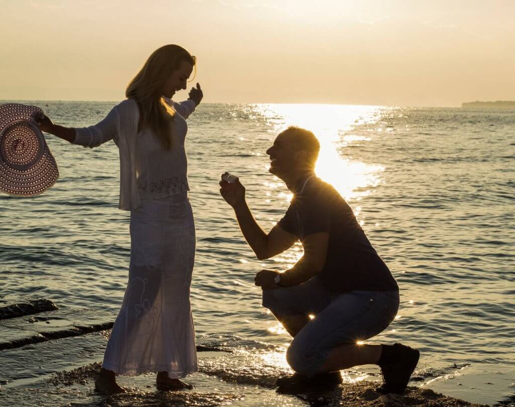 romantic seaside proposal moment