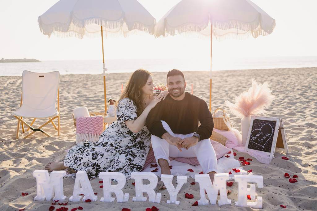 cozy beach picnic proposal