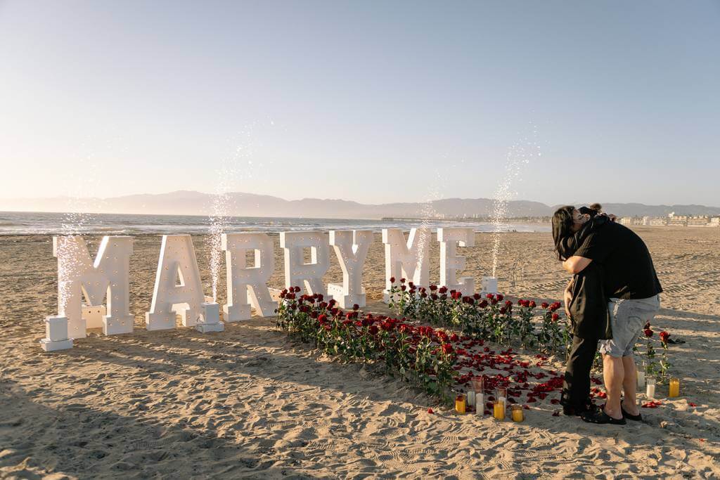 romantic beach proposal for her