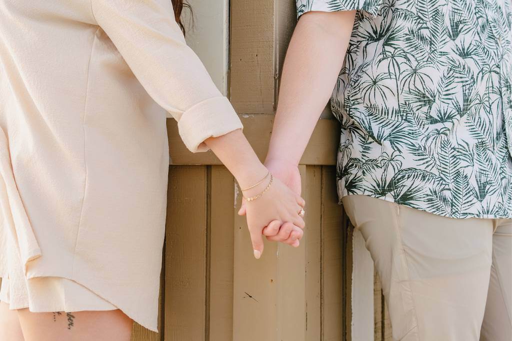 holding hands before the wedding