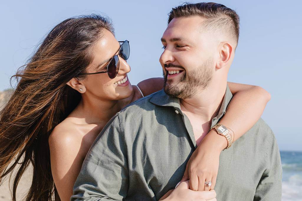happy couple by the ocean