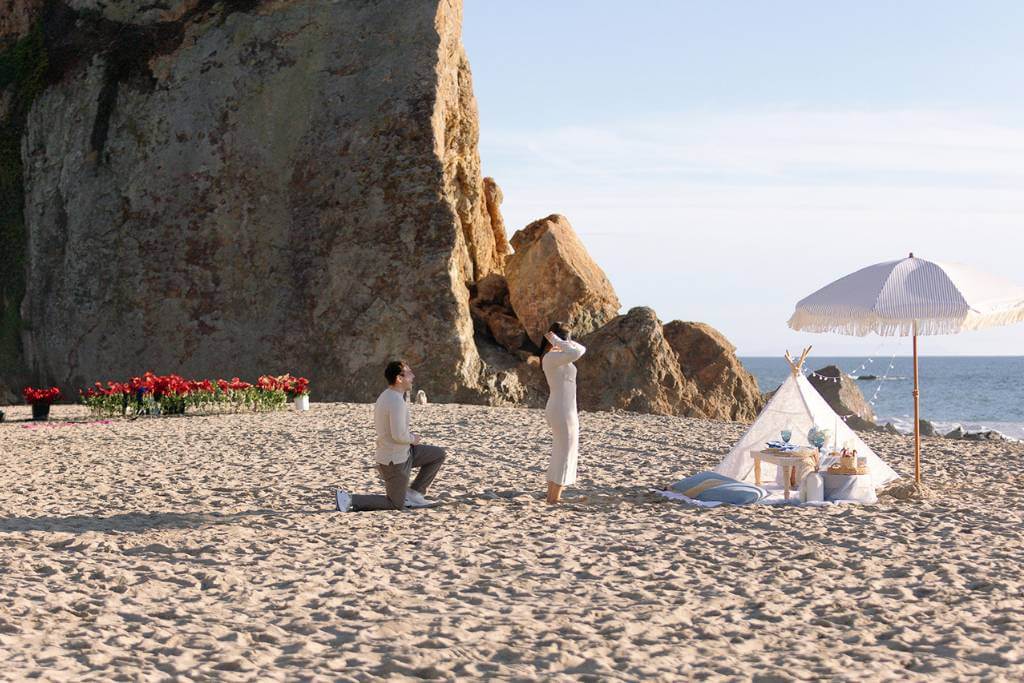 secluded beach proposal wide shot