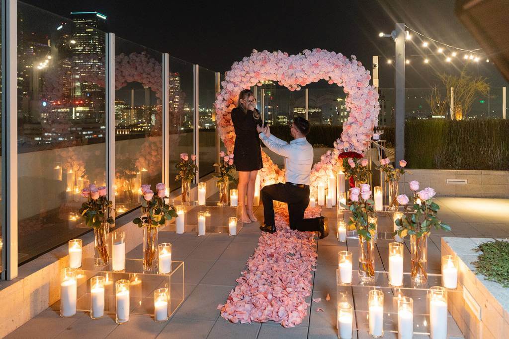 candlelit proposal arch reveal
