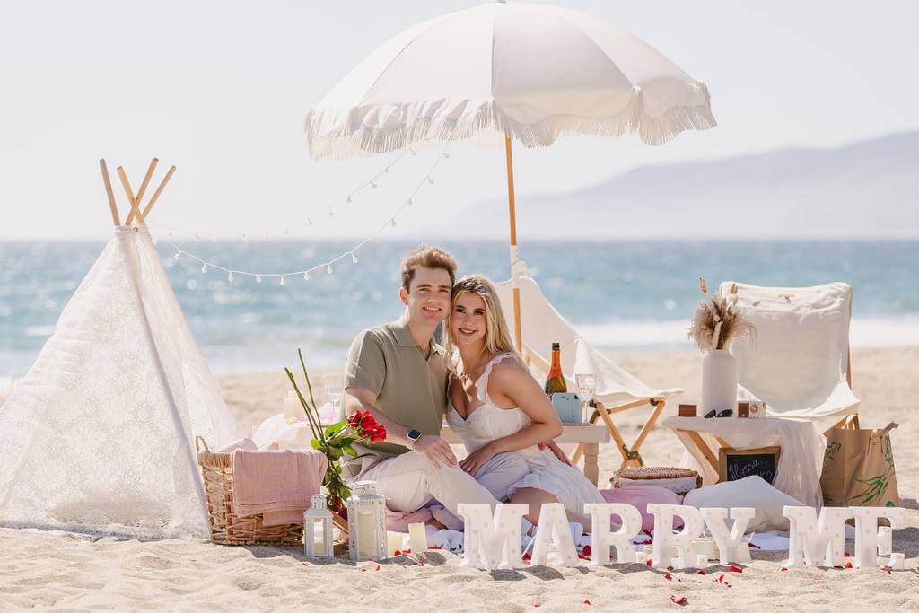 luxury beach picnic engagement