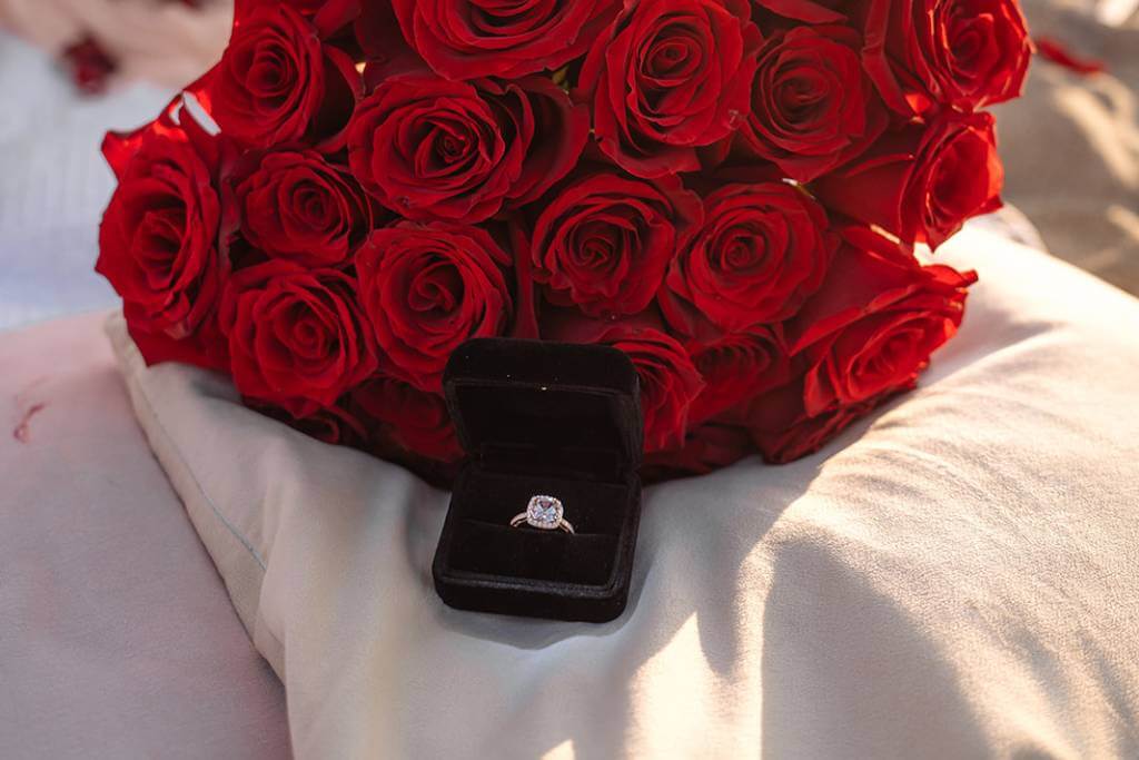 roses with engagement ring box