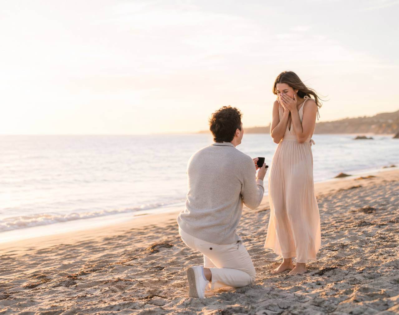 Proposal photographer capturing a romantic beach engagement in Los Angeles
